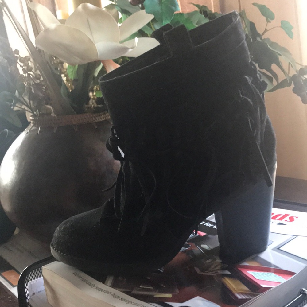 Moccasin style ankle boot.